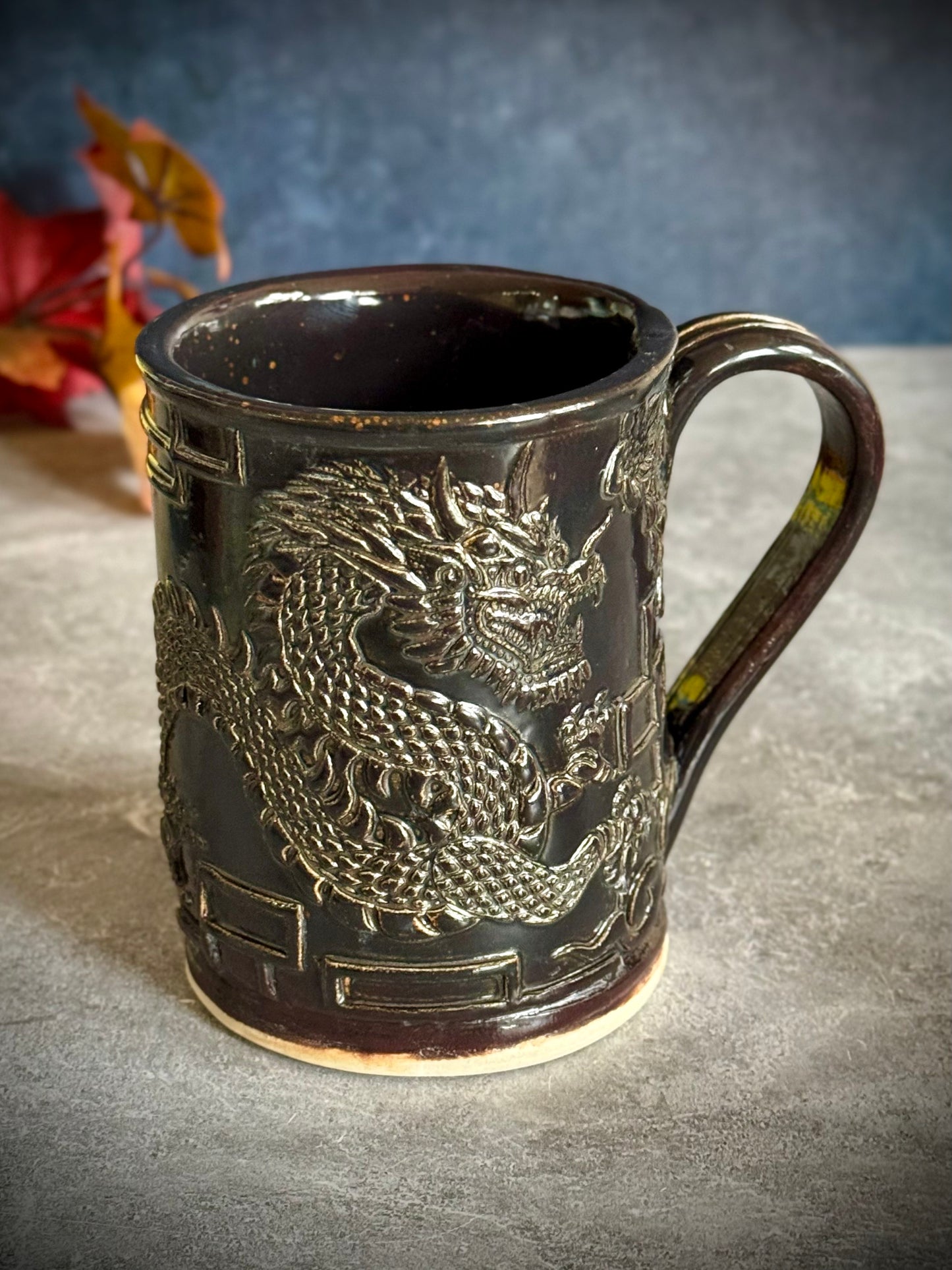 Embossed Dragon Mug – Black Iron Glaze
